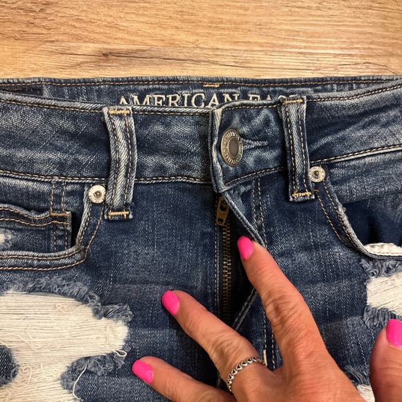 New AMERICAN EAGLE DENIM HI RISE SHORTIE STRETCH SHORTS DISTRESSED FRAY
Size 2 - Picture 4 of 6